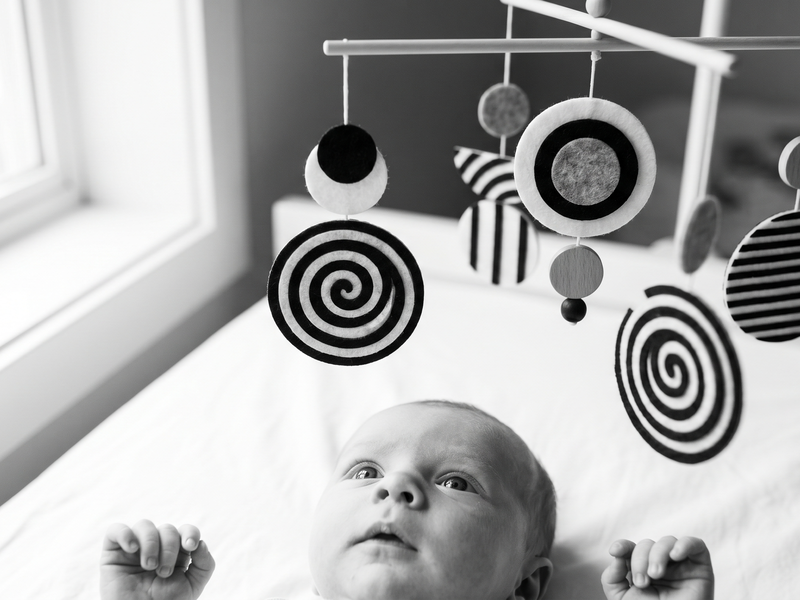 High contrast black and white baby mobile for newborn visual development