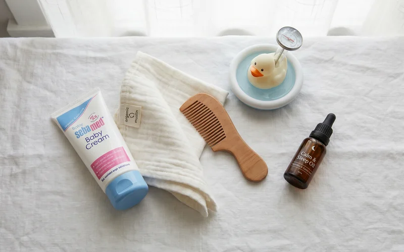 Sebamed baby facial cream 50ml with baby bath routine products — UK parent skincare setup